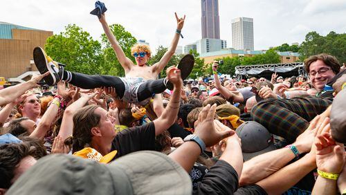 Crowd-surfing is always a popular activity at Shaky Knees, as can be seen in this photo from Saturday afternoon, May 4, 2024 as Bad Nerves performed. (RYAN FLEISHER FOR THE ATLANTA JOURNAL-CONSTITUTION)