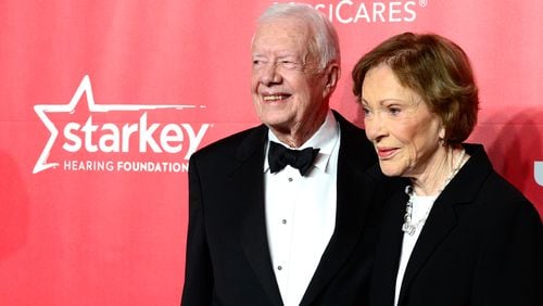 LOS ANGELES, CA - FEBRUARY 06: Former U.S. President Jimmy Carter (L) and former First Lady Rosalynn Carter attend the 25th anniversary MusiCares 2015 Person Of The Year Gala honoring Bob Dylan at the Los Angeles Convention Center on February 6, 2015 in Los Angeles, California. The annual benefit raises critical funds for MusiCares' Emergency Financial Assistance and Addiction Recovery programs. (Photo by Frazer Harrison/Getty Images) Former President Jimmy Carter and wife Rosalynn attended the MusiCares gala. Carter was set to present Dylan with an award. Photo: Getty Images.