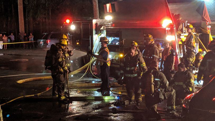Gwinnett County fire crews saw “a thick column of black smoke on the skyline” as they were arriving to a fire at the Forest Vale Apartments off Jimmy Carter Boulevard on Sunday night, department spokesman Donald Strother said.