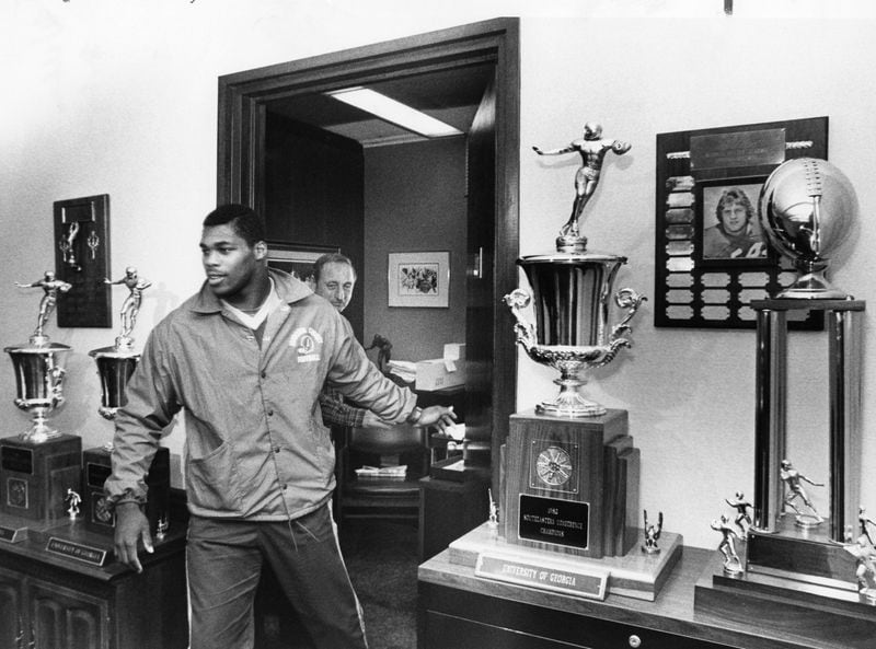 One of Herschel Walker's greatest strengths as a U.S. Senate candidate would be his name recognition as a football star who won the Heisman Trophy and led the University of Georgia to a national championship in 1980. W.A. Bridges Jr. / AJC file photo