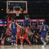 Team LeBron captain LeBron James of the Los Angeles Lakers dunks during the second half of the NBA All-Star basketball game Sunday, Feb. 16, 2020, in Chicago.