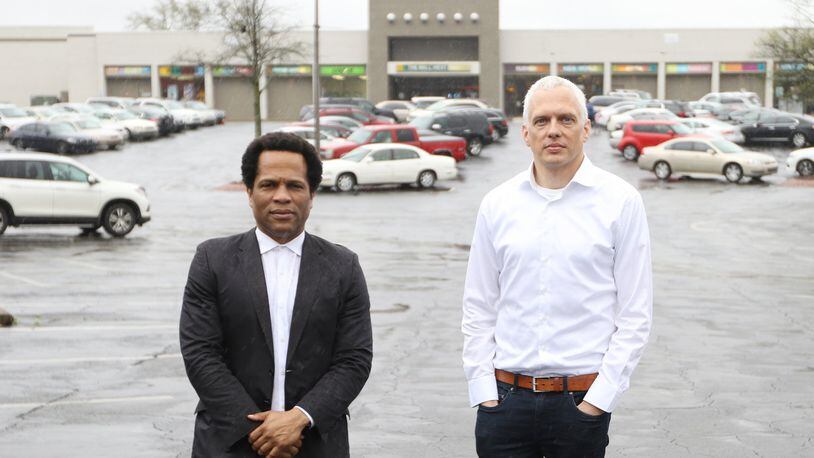Tech investor and entrepreneur Donray Von, left, and Atlanta Beltline mastermind Ryan Gravel talk to reporters at the Mall West End in Atlanta on Friday, March 15, 2019. EMILY HANEY / emily.haney@ajc.com