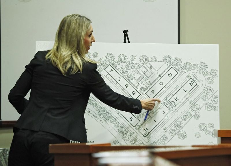 September 27, 2019 - Decatur - Defense attorney Amanda Clark Palmer uses a map of the apartment complex during cross examination of Pedro Castillo Flores to show where he was during the shooting. The murder trial of former DeKalb County Police Officer Robert “Chip” Olsen continued with testimony from prosecution witnesses this morning. Olsen is charged with murdering war veteran Anthony Hill. Bob Andres / robert.andres@ajc.com