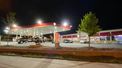 The shooting happened in the 2000 block of Candler Road near a gas station.