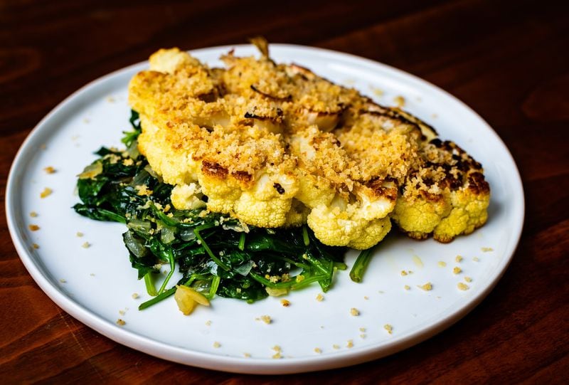 Quick Cauliflower Steaks with Sauteed Spinach. CONTRIBUTED BY HENRI HOLLIS