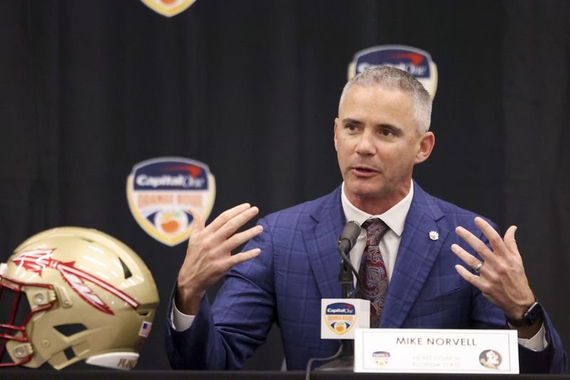 Florida State head coach Mike Norvell speaks during the head coaches joint press conference at the Le Meridien Dania Beach Hotel, Friday, Dec., 29, 2023, in Fort Lauderdale, Florida. (Jason Getz / Jason.Getz@ajc.com)