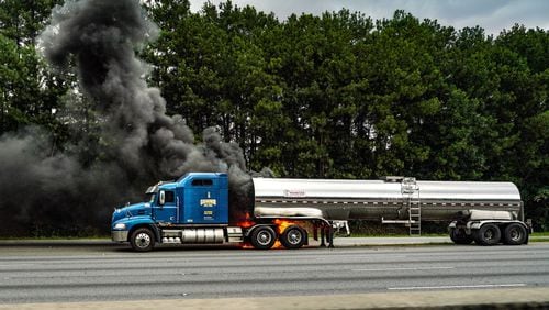 All eastbound lanes of I-285 in DeKalb County have reopened after a tanker truck caught fire Saturday afternoon, but heavy delays remain.