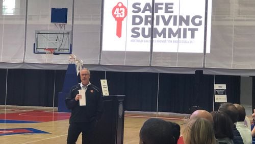 Mike Lutzenkirchen, executive director of the Lutzie 43 foundation, addresses high school drivers at the Safe Driving Summit at University of West Georgia on Thursday, March 31, 2022.