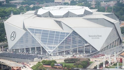 An off-duty Atlanta police officer required stitches after he was struck in the face with a glass bottle  while leaving Wednesday night’s Atlanta United game with his wife and a friend, police said.