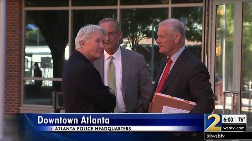 Claud “Tex” McIver confers with his lawyers. (Image courtesy of Channel 2 Action News)