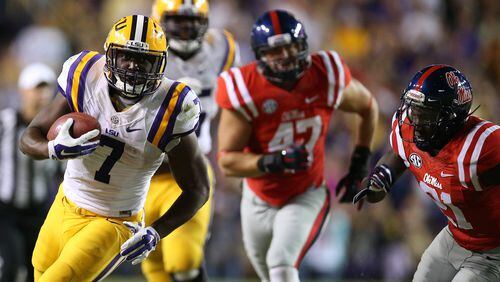 BATON ROUGE, LA - OCTOBER 25: Leonard Fournette #7 of the LSU Tigers runs the ball against the Mississippi Rebels at Tiger Stadium on October 25, 2014 in Baton Rouge, Louisiana. (Photo by Chris Graythen/Getty Images)