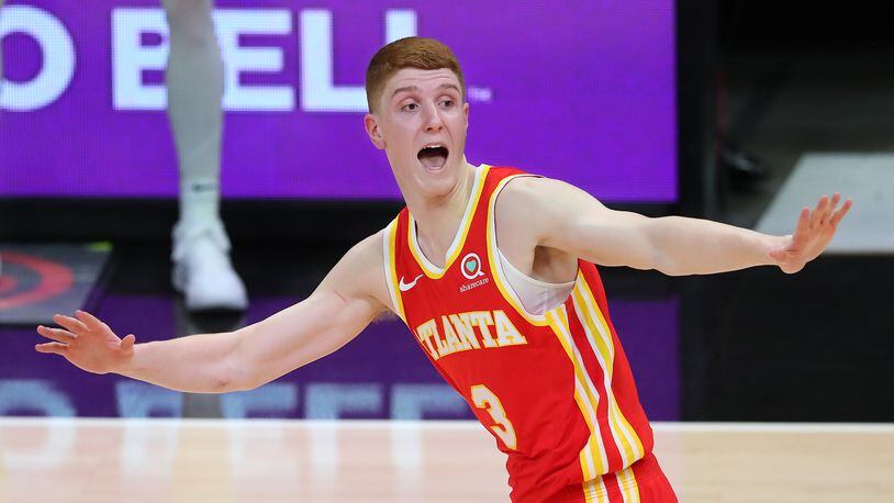 Hawks guard Kevin Huerter reacts after scoring against the Milwaukee Bucks during the second quarter of Game 3 of the Eastern Conference finals Sunday, June 27, 2021, at State Farm Arena in Atlanta. (Curtis Compton / Curtis.Compton@ajc.com)