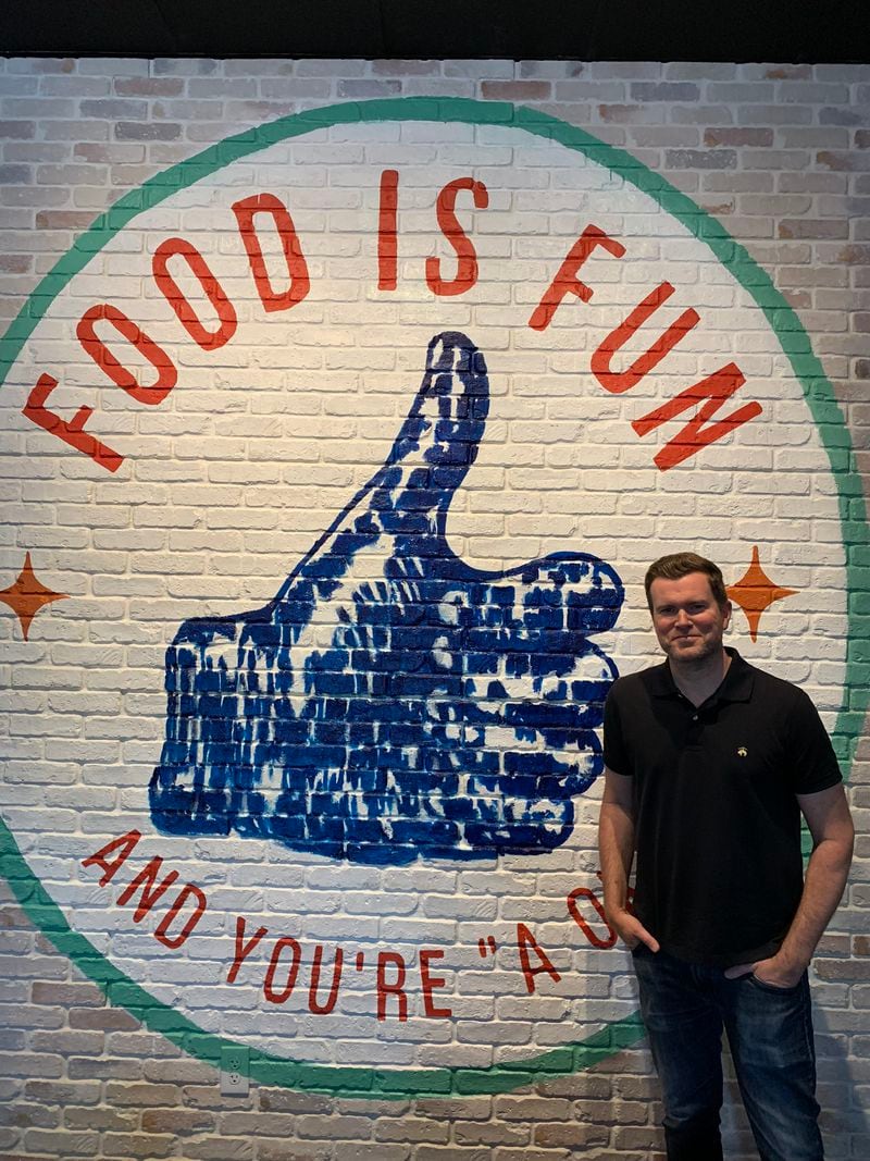 Justin Wilfon wanted Instagram-worthy images on the walls of his new restaurant Marietta Melt Yard including this one by Benjamin Smalwood. RODNEY HO/rho@ajc.com