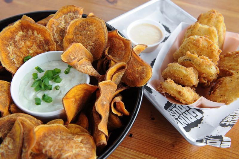 Sweet Potato Kettle Chips served with warm bleu cheese dip. Fried Pickles served with chipotle ranch dipping sauce. (BECKY STEIN PHOTOGRAPHY)