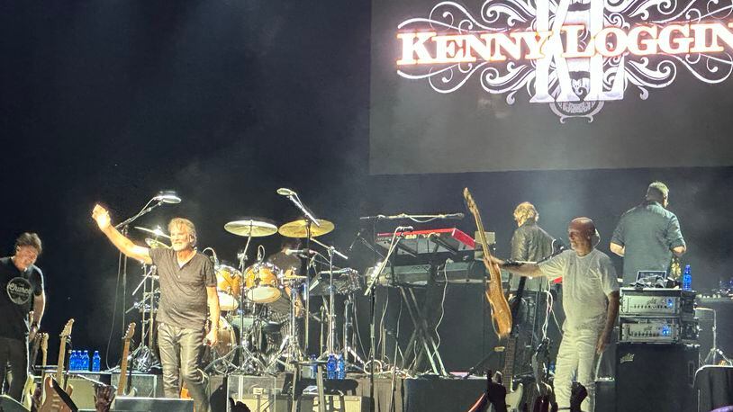 Kenny Loggins bids farewell to the sold-out Ameris Bank Amphitheatre crowd on Saturday, May 13, 2023. RODNEY HO/rho@ajc.com