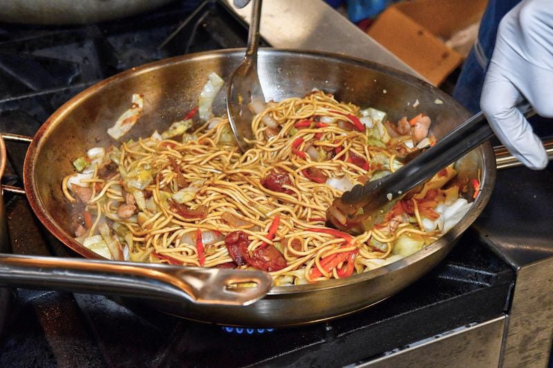 In Filipino cuisine, pancit is a general term that refers to stir-fried noodle dishes. One of the most common is pancit canton, made with wheat noodles. (CHRIS HUNT FOR THE ATLANTA JOURNAL-CONSTITUTION)