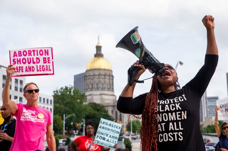 Demonstrators rally for abortion rights in front of the Georgia Supreme Court on June 30, 2022. A year ago, the U.S. Supreme Court overturned Roe v. Wade. (Chris Day/The Atlanta Journal-Constitution)