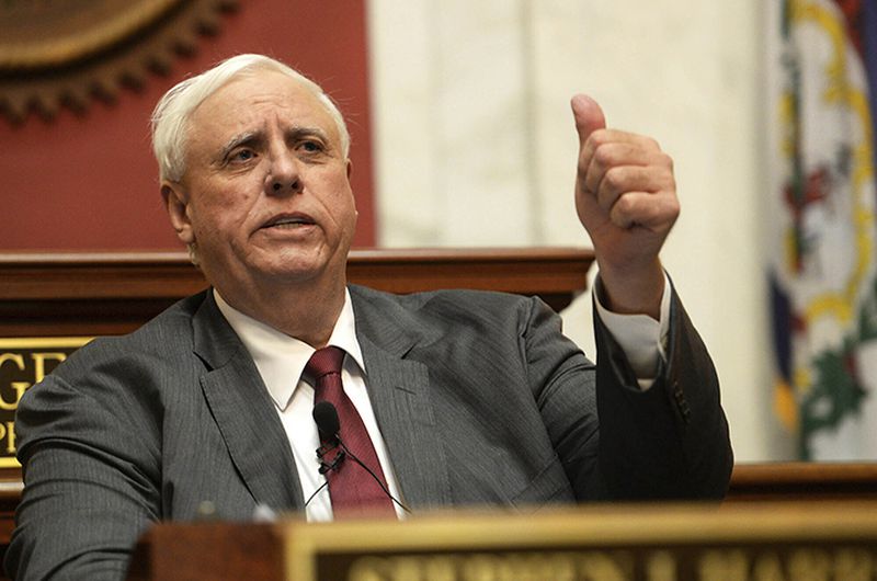 West Virginia Gov. Jim Justice is seeking to fire everyone who participated in an apparent Nazi salute.