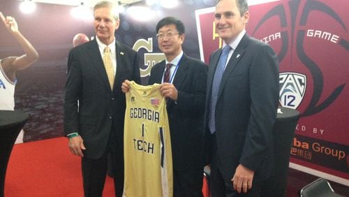 Georgia Tech president G.P. "Bud" Peterson with Chinese sports official XUE Yanqing and Pac-12 commissioner Larry Scott prior to Tech's game with UCLA in Shanghai.
