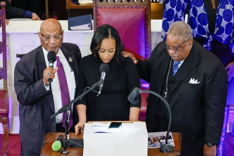 At the end of the worship service, Bishop Reginald T. Jackson (left) and Pastor John Foster say a prayer for Fulton County District Attorney Fani Willis at the Big Bethel AME church on Sunday, January 14, 2024.
Miguel Martinez /miguel.martinezjimenez@ajc.com