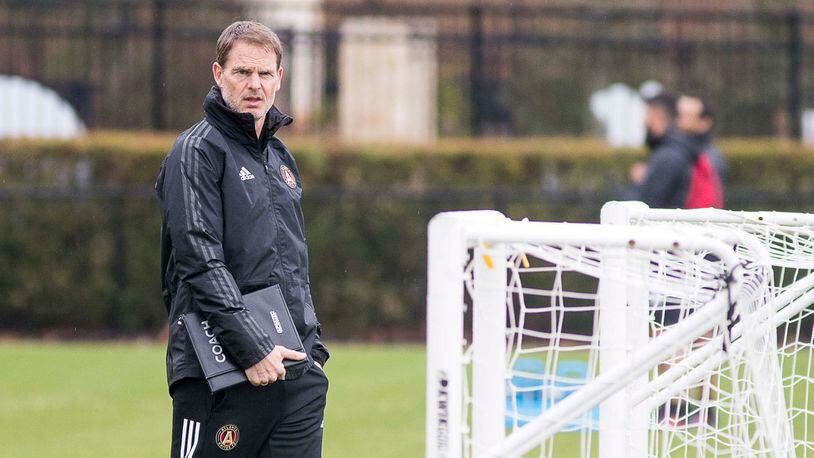 Atlanta United manager Frank de Boer watches the team as they practice at their training facility at the Children's Healthcare of Atlanta Training Ground, Monday, Jan. 13, 2020, in Marietta.
