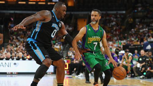 Mahmoud Abdul-Raufof 3 Headed Monsters handles the ball against Glen Davis of Power during week seven of the BIG3 3-on-3 basketball league at TD Garden on August 3, 2018 in Boston, Massachusetts.  (Photo by Maddie Meyer/BIG3/Getty Images)