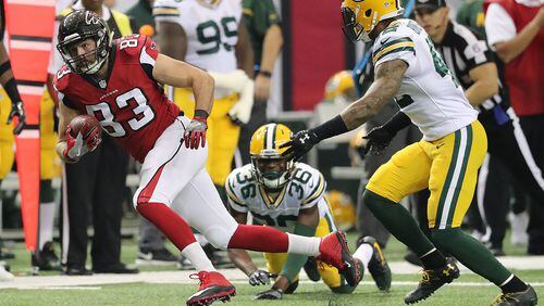 October 30, 2016 ATLANTA: Falcons tight end Jacob Tamme picks up yardage after catching a pass against the Packers during the first half in an NFL football game on Sunday, Oct. 30, 2016, in Atlanta. Curtis Compton /ccompton@ajc.com