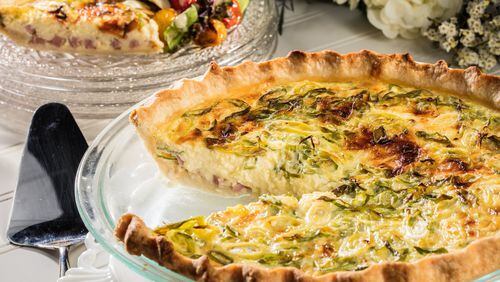In a variation on quiche Lorraine, ham and cheese flavor a simple custard of egg yolks and milk. (Zbigniew Bzdak/Chicago Tribune/TNS)