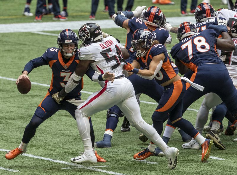 Falcons linebacker Foye Oluokun (54) sacks Denver Broncos quarterback Drew Lock (3) during the second quarter Sunday, Nov. 8, 2020, at Mercedes-Benz Stadium in Atlanta. (Alyssa Pointer / Alyssa.Pointer@ajc.com)