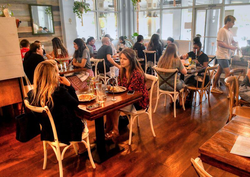 The dining room at Hen Mother Cookhouse seats 25, and the patio seats another 25. (CHRIS HUNT FOR THE ATLANTA JOURNAL-CONSTITUTION)