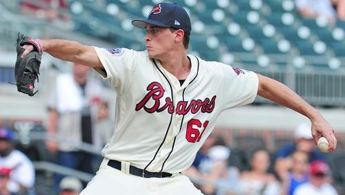 Braves prospect Max Fried delivers a pitch in an Aug. 20 game against the Reds, the last of his four relief appearances before he was optioned to Triple-A. He’ll make his first major league start Sunday against the Cubs at Wrigley Field. (Photo by Scott Cunningham/Getty Images)