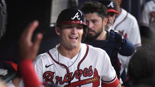Braves third baseman Austin Riley reacts after hitting a solo homer Saturday at Truist Park. Riley became a father for the first time Wednesday. (Hyosub Shin / Hyosub.Shin@ajc.com)