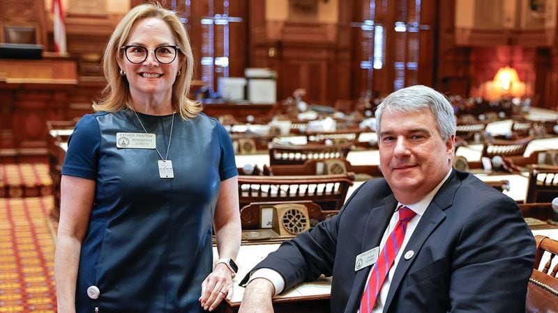 Rep. Esther Panitch, D-Sandy Springs, and Rep. John Carson, R-Marietta, on Jan. 29 in the House chambers at the Georgia State Capitol in Atlanta. (Natrice Miller/Natrice.miller@ajc.com)