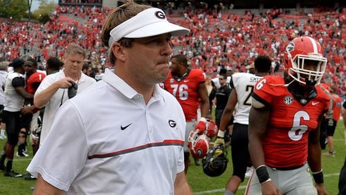 Georgia Bulldogs head coach Kirby Smart walks off the field after falling to the Vanderbilt Commodores 17-16 Saturday Oct. 15, 2016, at Sanford Stadium in Athens.