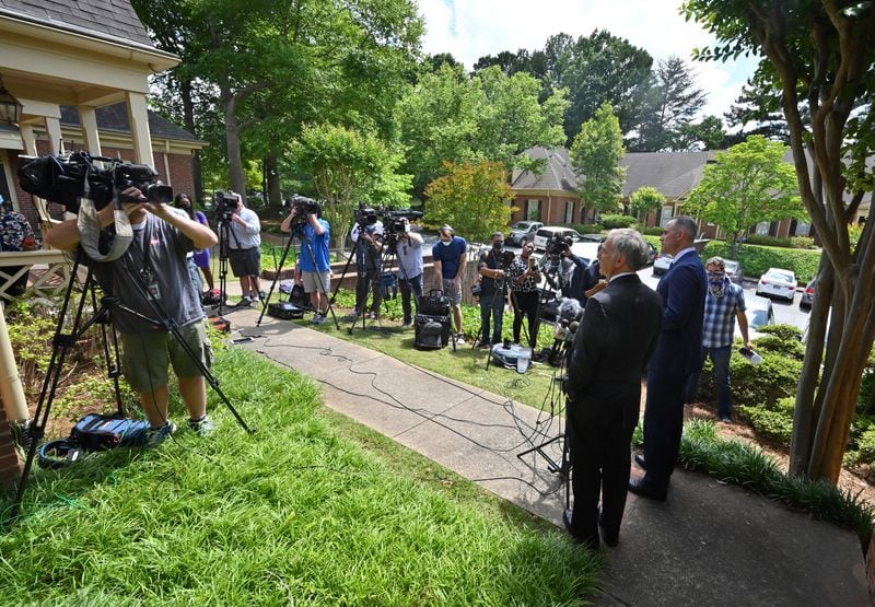 May 14, 2020 Decatur - Robert G. Rubin (left) and Jason B. Sheffield, lawyers for Travis and Gregory McMichael, speak to members of the press outside their office in Decatur on Thursday, May 14, 2020. The attorneys representing Travis McMichael, charged with murder in the death of Ahmaud Arbery, said they are committed to finding the truth in the case. (Hyosub Shin / Hyosub.Shin@ajc.com)