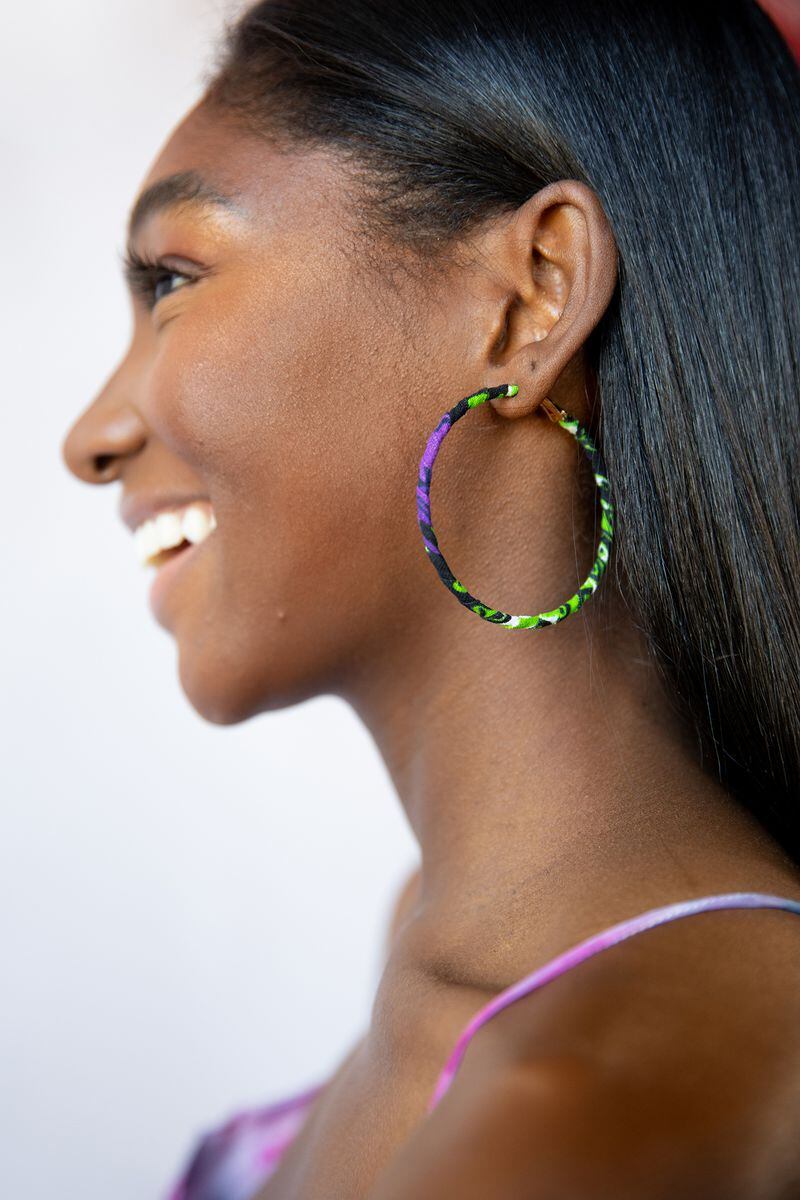 These cloth-covered, colorful hoops add a sense of glamour to any outfit.
Courtesy of Bombchel