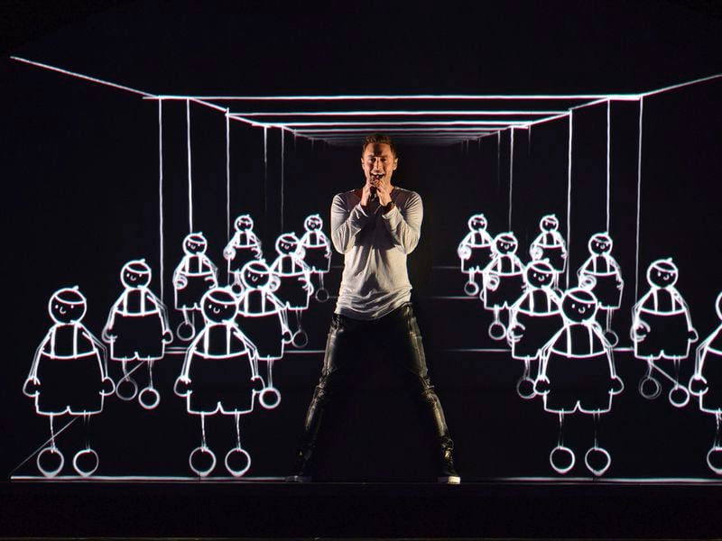 FILE - Sweden's Mans Zelmerlow performs the song 'Heroes' during a dress rehearsal for the second semifinal of the Eurovision Song Contest in Austria's capital Vienna, May 20, 2015. The 68th Eurovision Song Contest is taking place in May in Malmö, Sweden. It will see acts from 37 countries vie for the continent’s pop crown. Founded in 1956, Eurovision is a feelgood extravaganza that strives to banish international strife and division. It’s known for songs that range from anthemic to extremely silly, often with elaborate costumes and spectacular staging. (AP Photo/Kerstin Joensson, File)