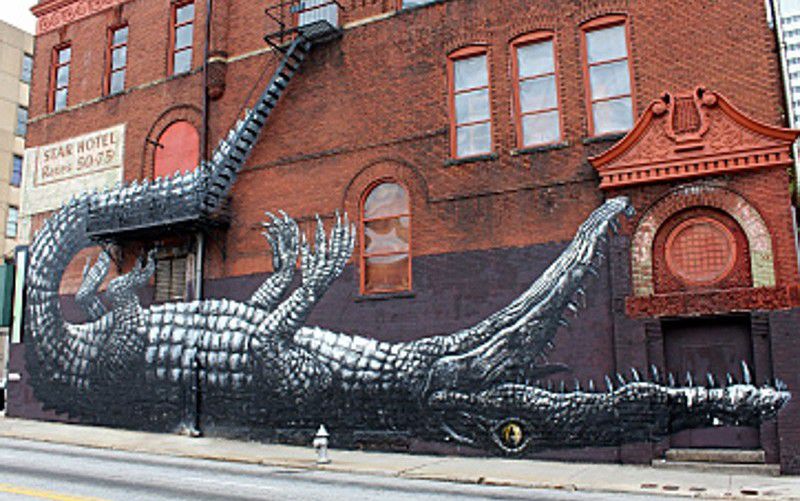 This mural of an alligator at 209 Mitchell St. SW was created by Belgian artist ROA in 2011