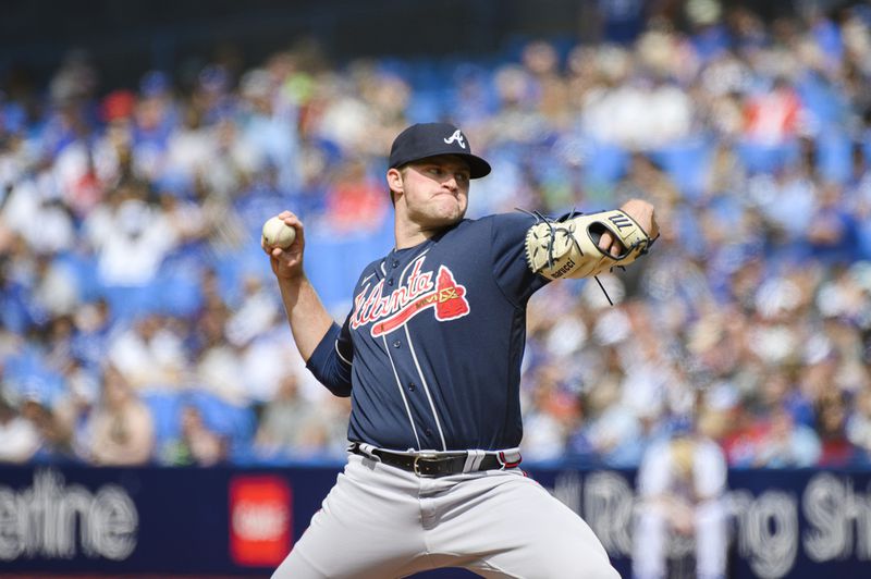 Atlanta Braves starting pitcher Bryce Elder (55) throws during the first inning of a baseball against the Toronto Blue Jays, Saturday, May 13, 2023, in Toronto. (Christopher Katsarov/The Canadian Press via AP)