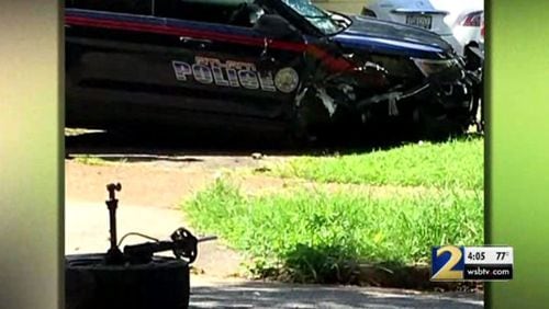 An Atlanta police officer has been placed on administrative leave after the Georgia State Patrol said he ran a stop sign, hitting and killing a man on a motorized scooter.