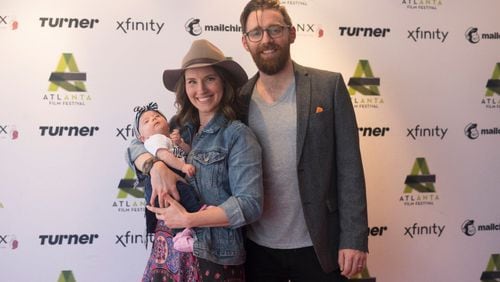 Matt Torney, a Belfast native and associate artistic director in Washington, D.C.'s  Studio Theatre, will be the new artistic director at downtown Atlanta's Theatrical Outfit. He is seen here with wife Amber McGinnis and their new daughter, Isla May Torney. CONTRIBUTED: MATT TORNEY