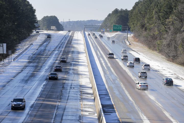 Photos: Frigid cold and snow move in to metro Atlanta