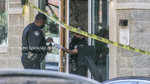 Atlanta police were called to the MAA Centennial Park Apartments on Centennial Olympic Park Drive about 9 a.m. Monday after two men were shot.