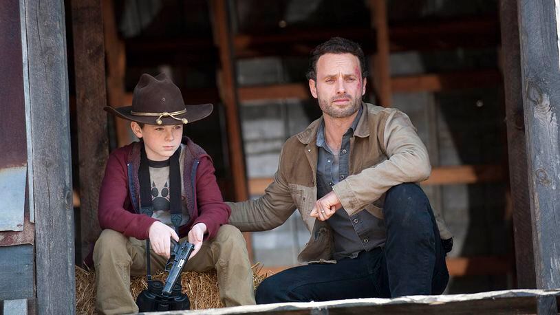 Georgia native Chandler Riggs was cast in "The Walking Dead" at age 10, but he'd been acting for three years by then. Chandler plays Carl Grimes, son of Rick Grimes, played by Andrew Lincoln. GENE PAGE / AMC