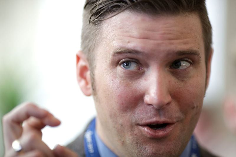 White supremacist Richard Spencer talks with reporters during the first day of the Conservative Political Action Conference at the Gaylord National Resort and Convention Center February 23, 2017 in National Harbor, Maryland. American Conservative Union Chairman Matt Schlapp said that Spencer was "not part of the agenda" at CPAC. Hosted by the American Conservative Union, CPAC is an annual gathering of right wing politicians, commentators and their supporters.  (Photo by Chip Somodevilla/Getty Images)