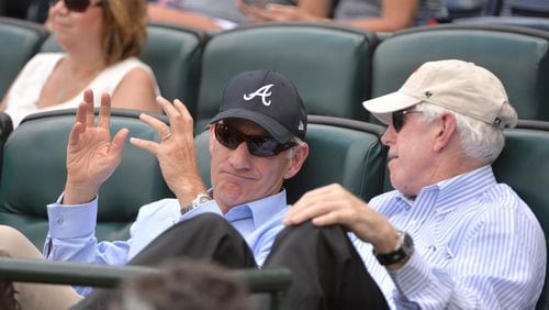Liberty Media CEO Greg Maffei (left) and Braves chairman and CEO Terry McGuirk talk during a Braves game in 2016.