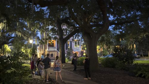 A ghost tour stops in the square formerly known as Calhoun Square in the heart of the landmark historic district in Savannah. The City Council is expected to pick a new name for square this week after it had been stripped of its moniker honoring John Calhoun, a staunch supporter of slavery who had been vice president in the 1820s and also represented South Carolina in the U.S. Senate. (AJC Photo/Stephen B. Morton)