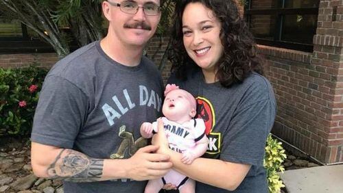 Kaitlin Hunt was holding her daughter, 3-month-old Riley, the night of Sept. 9 when they were struck by a vehicle in Woodstock. An online petition calls on the city to add crosswalks and better lighting at the accident site. FAMILY PHOTO