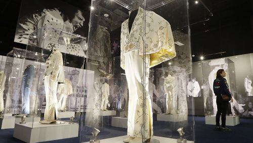 Some of Elvis Presley's performance outfits are displayed at the "Elvis Presley's Memphis" complex, Thursday, March 2, 2017, in Memphis, Tenn. The $45 million entertainment complex, located across the street from Graceland, Presley's longtime home, features exhibits and restaurants focused on his life and career. (AP Photo/Mark Humphrey)