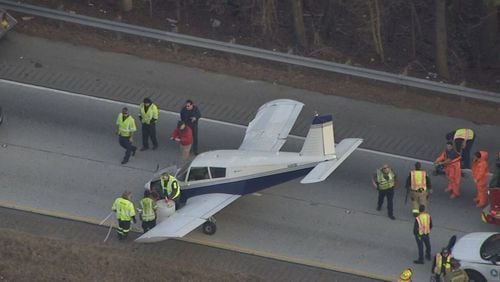 Pilot, passenger uninjured as plane crashes into semi-truck, makes emergency landing on I-985